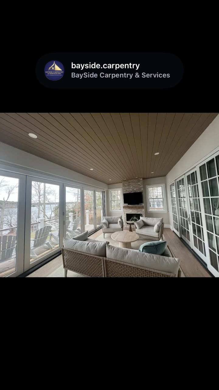 Wood ceiling and finish details in a waterfront sunroom.