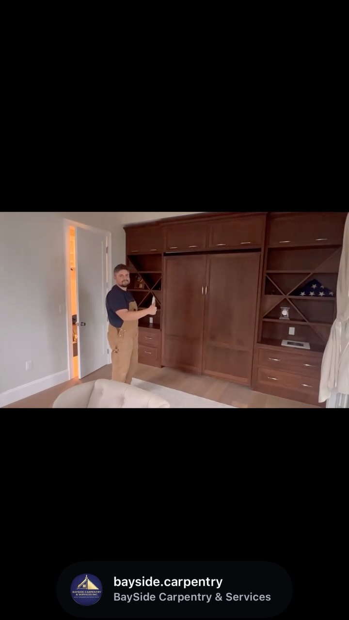 A full-wall wood cabinet installation.